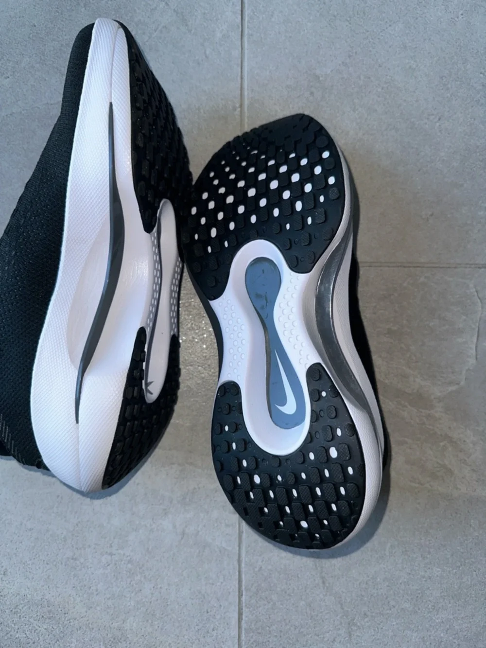 Nike Black Knit Slip-On Sneakers with White Swoosh